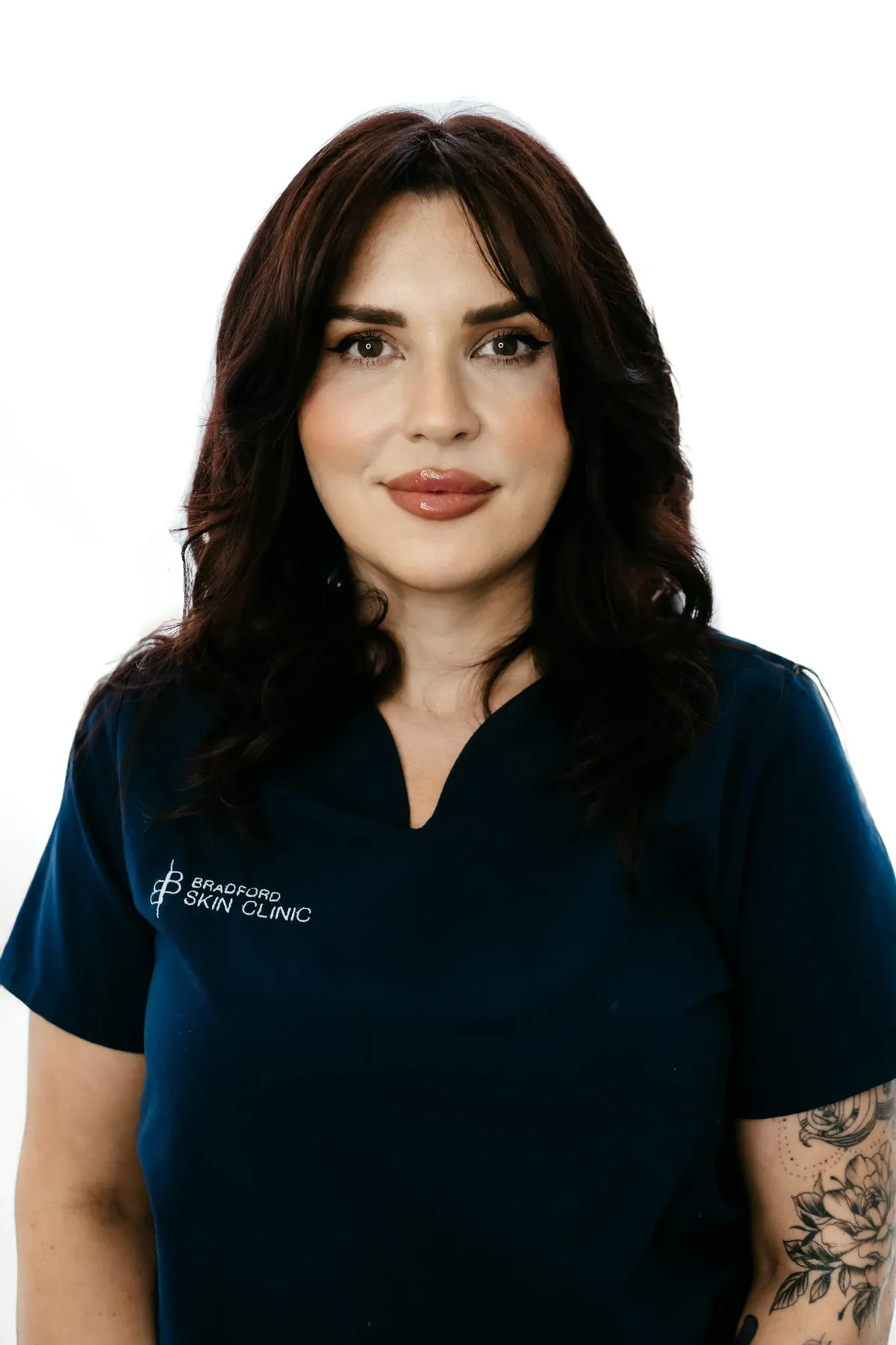 Yuliya Leonov in navy Bradford Skin Clinic scrubs